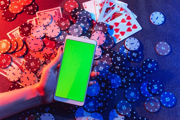 permen4d login Slots player on mobile phone with QRIS payment code ready to scan